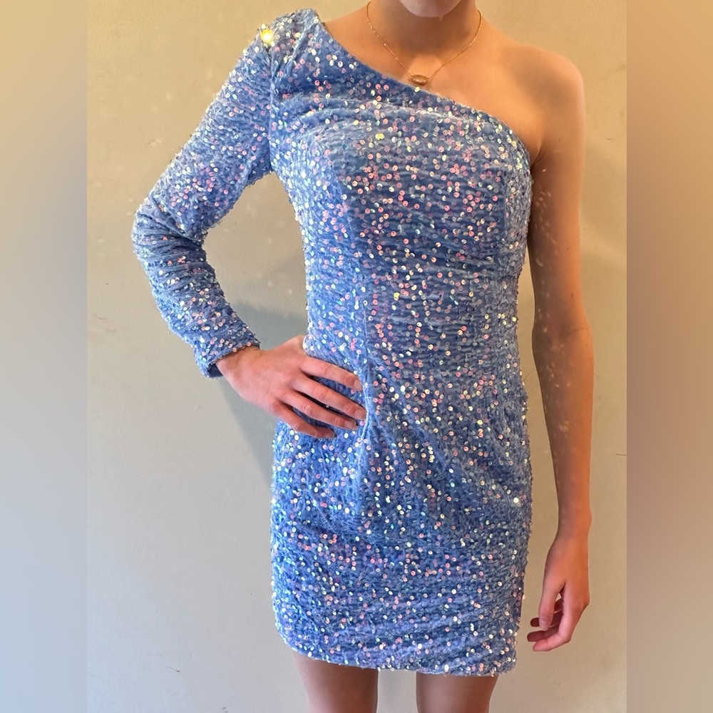 Brand new never worn Homecoming Prom Dress size 0 
blue periwinkle sequin.